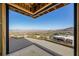 Expansive view of the city, mountains, and the golf course seen from the unfinished home at 1487 Reims Dr, Henderson, NV 89012