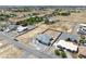 Aerial view of a house featuring a large backyard and surrounding neighborhood at 1691 Blackhorn St, Pahrump, NV 89048