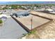 Aerial view showcasing a house with a sizable backyard, completely fenced in at 1691 Blackhorn St, Pahrump, NV 89048