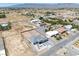 Aerial view showing a house with a large backyard and surrounding desert landscape at 1691 Blackhorn St, Pahrump, NV 89048