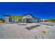 Modern home with landscaped yard and two-car garage at 1691 Blackhorn St, Pahrump, NV 89048