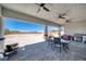 Spacious backyard patio, seating area, fire pit, and mountain views at 1691 Blackhorn St, Pahrump, NV 89048