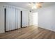 Spacious bedroom featuring wood-look flooring and bright lighting at 204 Orland St # 2, Las Vegas, NV 89107