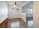 Open dining area with decorative lattice, leading into the living space with natural light at 204 Orland St # 2, Las Vegas, NV 89107