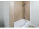 Clean tiled shower-tub combination with adjustable shower head at 204 Orland St # 2, Las Vegas, NV 89107