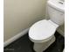 Simple bathroom featuring a toilet and dark tile floor at 4951 Schumann Dr, Las Vegas, NV 89146