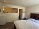 Bedroom with queen-size bed and access to private sitting area at 4951 Schumann Dr, Las Vegas, NV 89146