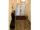 Bright entryway with double doors and wood-look flooring at 4951 Schumann Dr, Las Vegas, NV 89146