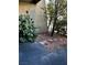 Landscaped front yard with gravel pathway and mature shrubs at 4951 Schumann Dr, Las Vegas, NV 89146