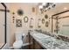 Charming bathroom with stained glass accents and granite countertop at 5205 Sandy Cactus Ln, Las Vegas, NV 89149