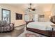 Serene main bedroom with a ceiling fan and plenty of natural light at 5205 Sandy Cactus Ln, Las Vegas, NV 89149