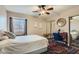 Bright bedroom with a desk and window seating area at 5205 Sandy Cactus Ln, Las Vegas, NV 89149