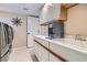 Laundry room with washer, dryer, and water dispenser at 5205 Sandy Cactus Ln, Las Vegas, NV 89149