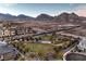 Aerial view of community park and mountain landscape at 11712 Emerald Lake Ave, Las Vegas, NV 89138