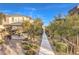 Landscaped community path with gazebo and seating area at 11712 Emerald Lake Ave, Las Vegas, NV 89138