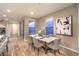 Elegant dining room with a marble table and modern chairs at 11712 Emerald Lake Ave, Las Vegas, NV 89138