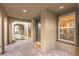 Covered entryway with brick pavers and a modern front door at 11712 Emerald Lake Ave, Las Vegas, NV 89138