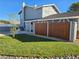 Landscaped yard with lush green grass, privacy fence, and a well-maintained exterior showcasing great curb appeal at 3531 W Arby Ave, Las Vegas, NV 89118