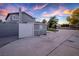View of the rear yard featuring a well-maintained privacy fence and additional storage on a concrete pad at 3531 W Arby Ave, Las Vegas, NV 89118