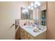 Bathroom with single sink vanity and updated light fixture at 2302 El Molino Cir, Las Vegas, NV 89108