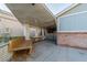 Covered patio with wooden bench and table at 2302 El Molino Cir, Las Vegas, NV 89108