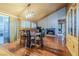 Bright dining room with hardwood floors, fireplace and chandelier at 2302 El Molino Cir, Las Vegas, NV 89108