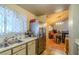 Kitchen with stainless steel refrigerator and view of the dining area at 2302 El Molino Cir, Las Vegas, NV 89108