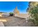 Backyard with covered patio and gravel at 6143 Basilone Ave, Las Vegas, NV 89122