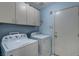 Laundry room with Whirlpool washer and dryer at 6143 Basilone Ave, Las Vegas, NV 89122