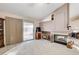 Living area featuring a fireplace, sliding glass door to patio, and hardwood floors at 6143 Basilone Ave, Las Vegas, NV 89122