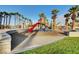 Community playground with slide and playset at 6143 Basilone Ave, Las Vegas, NV 89122