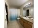 Clean bathroom with shower/tub combo and modern vanity at 2760 Stargate St, Las Vegas, NV 89108