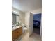 Neat bathroom with a single sink and view of bedroom at 2760 Stargate St, Las Vegas, NV 89108