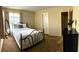 Charming bedroom with a metal bed frame and plenty of light at 2760 Stargate St, Las Vegas, NV 89108