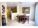 Kitchen and dining area with wood table and chairs at 2760 Stargate St, Las Vegas, NV 89108