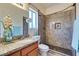 Bathroom with granite countertop and large shower at 445 Wright Way, Henderson, NV 89015