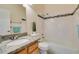 Clean bathroom with granite countertop, tub, and shower at 445 Wright Way, Henderson, NV 89015