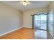 Bedroom with hardwood floors and sliding door to patio at 445 Wright Way, Henderson, NV 89015