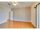 Spacious bedroom featuring hardwood floors and ceiling fan at 445 Wright Way, Henderson, NV 89015