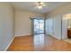 Bedroom with hardwood floors and sliding door to patio at 445 Wright Way, Henderson, NV 89015