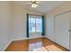 Bright bedroom featuring a large window and wood flooring at 445 Wright Way, Henderson, NV 89015