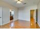 Bedroom with hardwood floors and access to bathroom at 445 Wright Way, Henderson, NV 89015