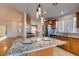 Spacious kitchen with granite countertops and stainless steel appliances at 445 Wright Way, Henderson, NV 89015