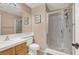 Clean bathroom featuring a glass shower, tile floors, and a simple vanity at 6192 Rocky Top Ave, Las Vegas, NV 89110