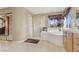 Well-lit bathroom featuring shower, tub, vanity, and natural light from a window at 6192 Rocky Top Ave, Las Vegas, NV 89110