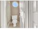 Small bathroom featuring a toilet and a shower with a curtain at 6192 Rocky Top Ave, Las Vegas, NV 89110