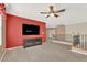 Upstairs living room with railing and wall mounted TV at 6192 Rocky Top Ave, Las Vegas, NV 89110