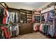 Walk-in closet with built-in storage and organization system at 647 Foxhall Rd, Henderson, NV 89002