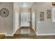 Welcoming home foyer with decorative tile, wood floors, and a bright front door at 647 Foxhall Rd, Henderson, NV 89002