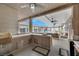 Spacious outdoor kitchen featuring ample counter space, modern appliances, and an adjacent pool area at 647 Foxhall Rd, Henderson, NV 89002